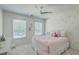 Bright bedroom with whimsical decor, soft carpet, and a charming window view at 2150 Terrabrook Ln, Charleston, SC 29412