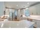Bright kitchen with white cabinets, stainless steel appliances, subway tile backsplash, and quartz countertops at 2150 Terrabrook Ln, Charleston, SC 29412