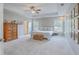 Spacious main bedroom with natural light, neutral tones, and dresser at 2150 Terrabrook Ln, Charleston, SC 29412