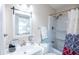 Bright bathroom featuring a modern sink, vanity, tub, and shower at 2186 Spoleto Ln, North Charleston, SC 29406