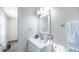 Clean bathroom featuring a white vanity and modern mirror fixture at 2186 Spoleto Ln, North Charleston, SC 29406