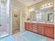 Bathroom with a walk-in shower and double sink vanity at 269 Village Stone Cir, Summerville, SC 29483