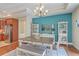 Dining room with open access to the kitchen, a dining table with chairs and bench, and modern décor at 269 Village Stone Cir, Summerville, SC 29483