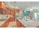 Spacious kitchen features granite countertops, stainless steel appliances, and a large island with seating at 269 Village Stone Cir, Summerville, SC 29483