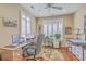 Home office with natural light, hardwood floors, and built-in desk at 269 Village Stone Cir, Summerville, SC 29483