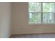 Bright bedroom with large window and neutral walls, offering a serene space at 2703 Scarlett Maple St, Summerville, SC 29486
