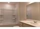 Clean bathroom with a shower-tub combo and a vanity with a mirror at 2704 Scarlett Maple St, Summerville, SC 29486