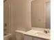 Bathroom featuring a tub-shower, sink, and toilet at 2704 Scarlett Maple St, Summerville, SC 29486