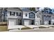 New townhomes featuring varied siding and attached garages at 2704 Scarlett Maple St, Summerville, SC 29486