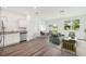 Open-concept living and dining area with stainless steel appliances at 2704 Scarlett Maple St, Summerville, SC 29486