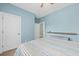 Bedroom with a bed with striped blankets and a shelf for storage at 2961 Sweetleaf Ln, Johns Island, SC 29455