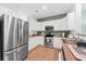 Kitchen featuring stainless steel appliances and white cabinets at 2961 Sweetleaf Ln, Johns Island, SC 29455