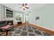 Comfortable living room boasts cozy fireplace, recessed lighting, and open floor plan at 2961 Sweetleaf Ln, Johns Island, SC 29455