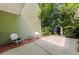 The backyard patio with two chairs is the perfect place to enjoy the outdoors at 2961 Sweetleaf Ln, Johns Island, SC 29455