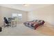 Bright bedroom with carpet flooring, natural light, and space for a bed and a desk, creating a comfortable retreat at 299 Lucca Dr, Summerville, SC 29486