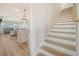 Entryway with wood floor and staircase leading to the upper level of the home at 299 Lucca Dr, Summerville, SC 29486