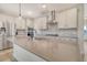 Kitchen featuring an island with sink, stainless appliances, gray countertops, and white cabinets at 299 Lucca Dr, Summerville, SC 29486
