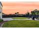 Expansive backyard featuring a well-manicured lawn and a gravel area with comfortable seating at 3018 Vincent Astor Dr, Johns Island, SC 29455