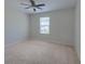 Neutral bedroom features include a ceiling fan, natural light and plush carpet at 3018 Vincent Astor Dr, Johns Island, SC 29455