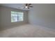 Bright bedroom with natural light, ceiling fan, and a view of the community outside at 3018 Vincent Astor Dr, Johns Island, SC 29455