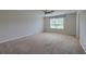 An airy bedroom with natural light, neutral carpet, and space for personalization at 3018 Vincent Astor Dr, Johns Island, SC 29455
