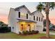 Charming two-story home with manicured lawn, attached garage and inviting curb appeal at 3018 Vincent Astor Dr, Johns Island, SC 29455