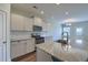 Spacious kitchen featuring granite countertops, gas range, stainless appliances, and ample cabinet space at 3018 Vincent Astor Dr, Johns Island, SC 29455