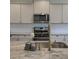 Granite countertops, a stainless steel sink, and modern appliances highlight the kitchen's functionality at 3018 Vincent Astor Dr, Johns Island, SC 29455