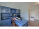 Well-appointed home office with custom built-ins, hardwood floors, and ample workspace at 3018 Vincent Astor Dr, Johns Island, SC 29455