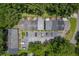 Overhead shot features the community with well-maintained parking and mature trees at 302 Springview Ln # 7, Summerville, SC 29485