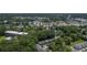 Expansive aerial view of the community nestled among lush green trees and close to stores at 302 Springview Ln # 7, Summerville, SC 29485