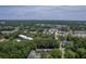 High aerial view revealing community townhomes surrounded by the forest and other urban amenities at 302 Springview Ln # 7, Summerville, SC 29485