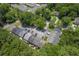 Aerial view showcases the community with ample parking surrounded by lush greenery at 302 Springview Ln # 7, Summerville, SC 29485