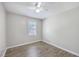 Light-filled bedroom featuring wood-look floors and neutral wall color at 302 Springview Ln # 7, Summerville, SC 29485