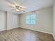 Well-lit bedroom with wood-look flooring, closet, and a bright, airy feel at 302 Springview Ln # 7, Summerville, SC 29485