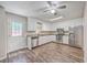 Modern kitchen with white cabinets, stainless steel appliances, and hardwood floors at 302 Springview Ln # 7, Summerville, SC 29485