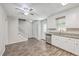Bright, open kitchen with stainless steel dishwasher, granite counters, and wood flooring at 302 Springview Ln # 7, Summerville, SC 29485