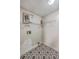 Dedicated laundry room featuring patterned flooring and open shelving for storage solutions at 302 Springview Ln # 7, Summerville, SC 29485