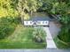 Charming home featuring lush landscaping, a well-manicured lawn, and a long driveway at 3435 Hobson Dr, Johns Island, SC 29455