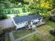 Aerial view of the home showing the outdoor entertaining deck, fenced yard and landscaping at 3435 Hobson Dr, Johns Island, SC 29455