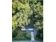 Aerial view of home nestled among green trees, offering privacy and a serene environment at 3435 Hobson Dr, Johns Island, SC 29455