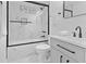 Well-lit bathroom with marble tiling, modern fixtures, and a stylish vanity at 3435 Hobson Dr, Johns Island, SC 29455