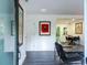 View from the front door showing how the living room and kitchen flow together in this modern home at 3435 Hobson Dr, Johns Island, SC 29455
