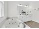 Bathroom with a jacuzzi-style tub and a double vanity, perfect for relaxation at 3513 Flowering Oak Way, Mount Pleasant, SC 29466