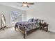 Spacious bedroom with ample natural light, a patterned bedspread, a wooden mirror, and carpet flooring at 3513 Flowering Oak Way, Mount Pleasant, SC 29466