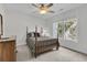 Inviting bedroom with natural light, a patterned bedspread, neutral walls, and carpet flooring at 3513 Flowering Oak Way, Mount Pleasant, SC 29466