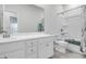 Bright bathroom features white cabinets, tile floors and a shower and tub combination at 3524 Great Egret Dr, Johns Island, SC 29455