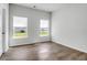 Bedroom with neutral walls, wood-look flooring and lots of natural light at 3524 Great Egret Dr, Johns Island, SC 29455