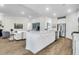 Modern kitchen with a large island, white cabinetry, and stainless steel appliances at 3524 Great Egret Dr, Johns Island, SC 29455