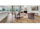 Well-lit living space featuring elegant design elements and views to the lake at 3524 Great Egret Dr, Johns Island, SC 29455